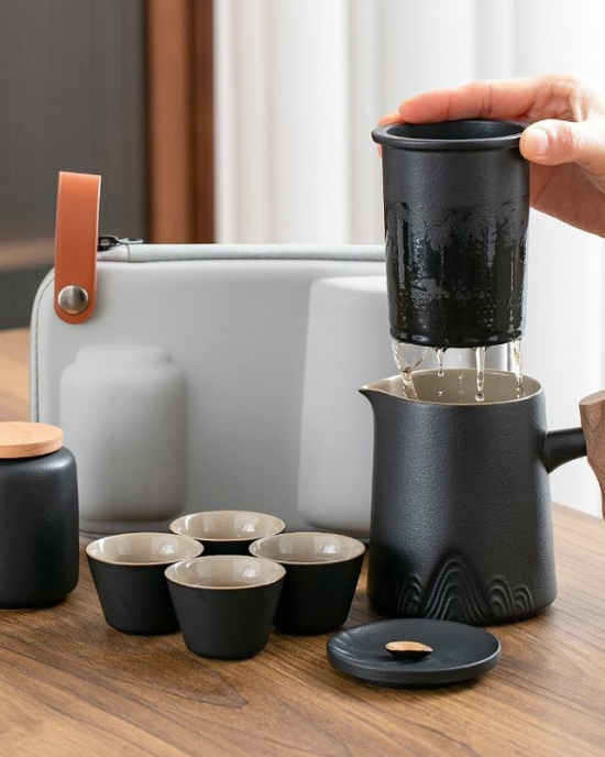 Zhou Travel Tea Set With Ceramic Camellia Leaf Jar And Four Cups Portable Outdoor Camping Style Treasure Good For Goods Zhou Travel Tea Set With Ceramic Camellia Leaf Jar And Four Cups Portable Outdoor Camping Style Treasure Good For Goods